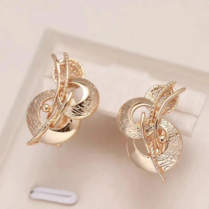 Guggenheim Elegant Earrings in Gold Unique Joyas