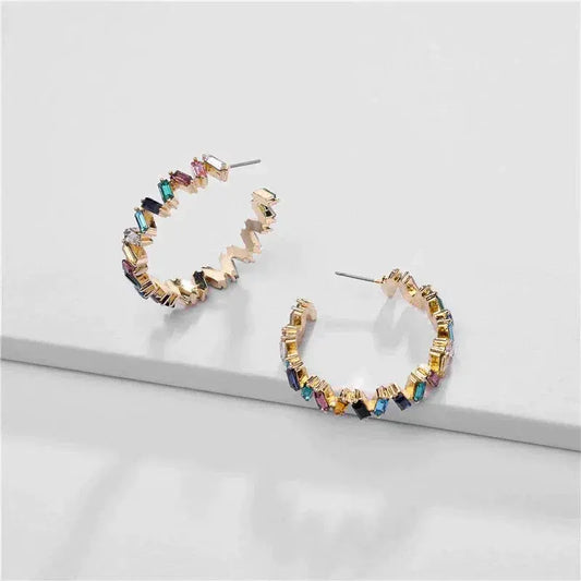 Gold earrings with colored stones Unique Joyas