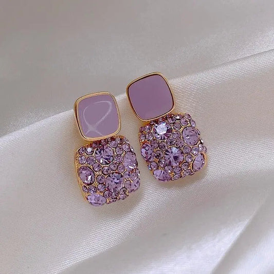 Luxurious purple earrings with zirconia inlay Unique Joyas